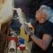 Working on the outside of the hull with a bucking iron.