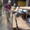 Clarke Olsen cutting trim for the cabin roof