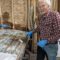 Don Hegeman rolls on the epoxy